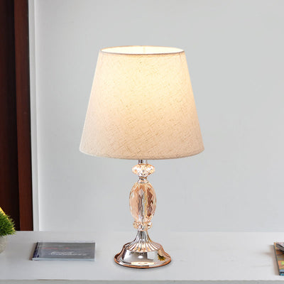 Modern Design Table Lamp with Tapered Shape and Facet-Cut Glass Blocks