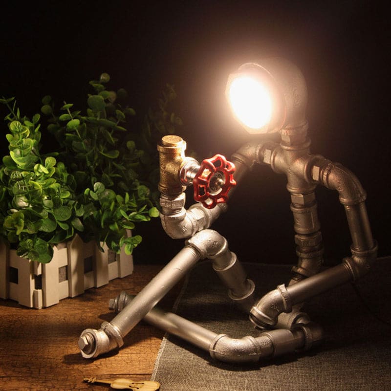 Industrial Iron Pipe Man Nightstand Light